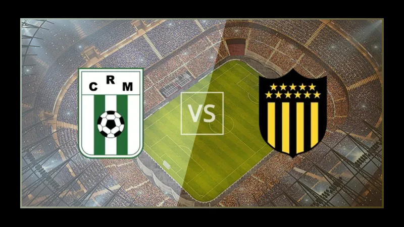 Cầu thủ Racing Montevideo và Penarol tranh chấp bóng trên sân
