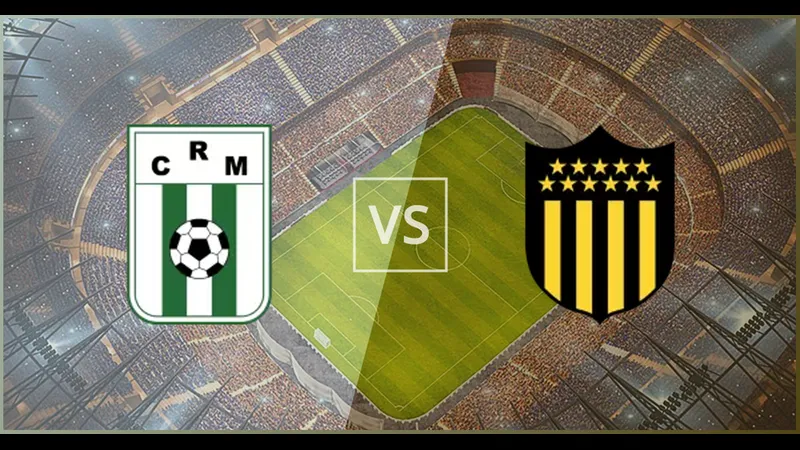 Cầu thủ Racing Montevideo và Penarol đối mặt trên sân cỏ